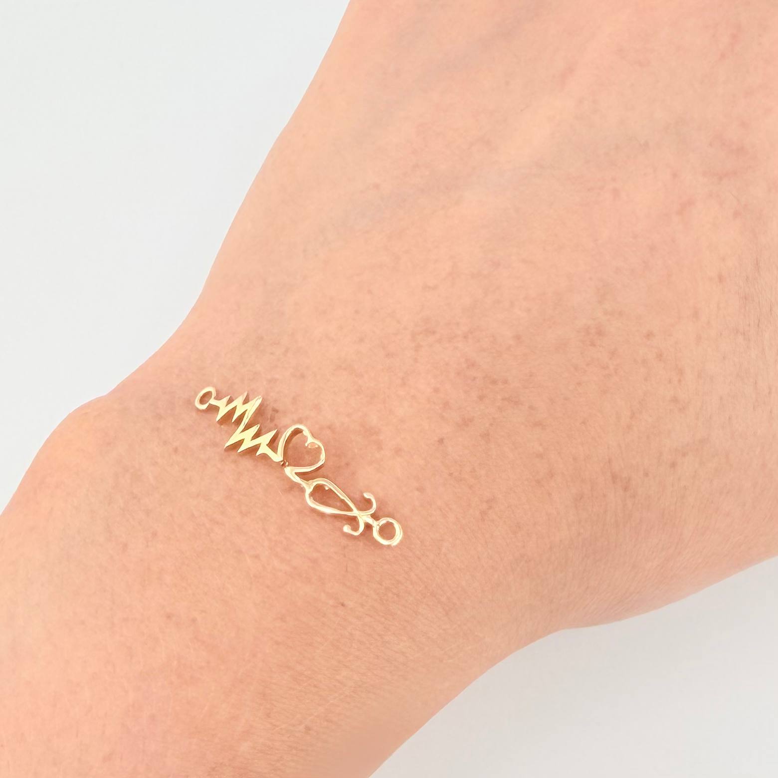 Herraje Corazon Electrocardiograma 0.8gr / 2.9cm / Oro Amarillo 18K