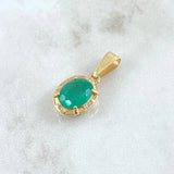Dije Ovalo 2.8gr / 2.4cm / Diamantes 6pts Esmeralda 3.1 Qts Oro Amarillo 18K (Joya) ©