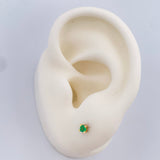 Topos Cuatro Garras Esmeralda 0.75gr / Oro Amarillo 18K &