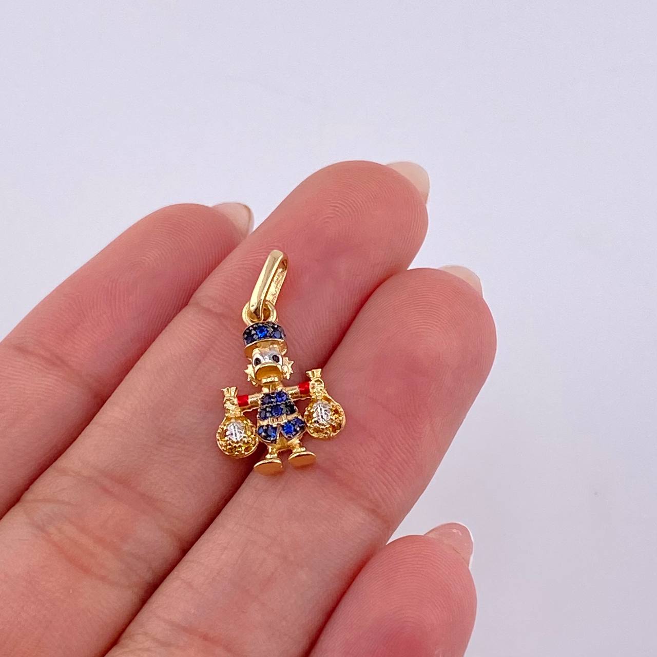 Dije Pato Bolsa Dinero 1.4gr / 2.3cm / Oro Amarillo 18K ©