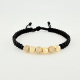 Pulsera Tejida Negra Bolas de Fuego Bolas Diamantadas Oro Amarillo 18K