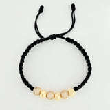 Pulsera Tejida Negra Bolas de Fuego Bolas Diamantadas Oro Amarillo 18K