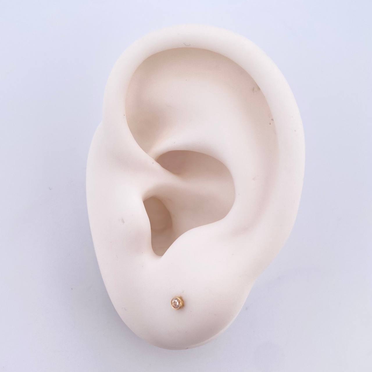 Topos Bisel 0.4gr / 2mm Circon Blanco Oro Amarillo 18K ©