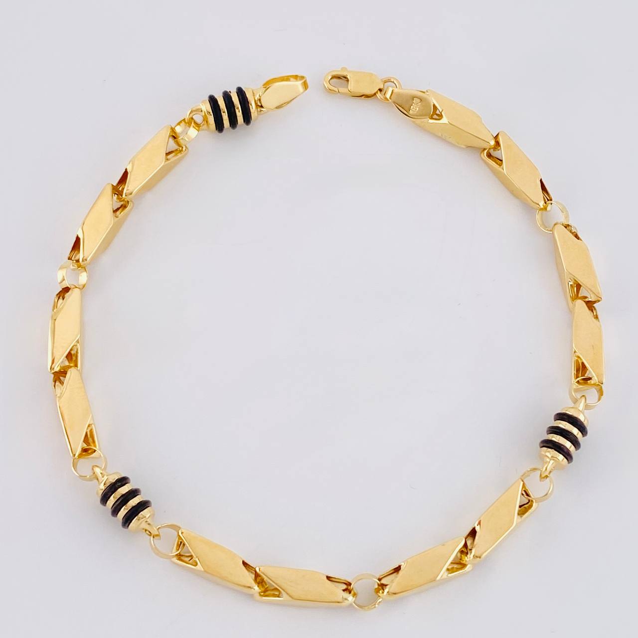 Pulso Rustico Cauchos Negros 5.95 g / 21 cm / 5 mm Oro Amarillo 18K