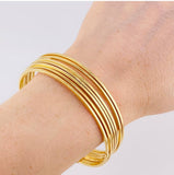 Pulso 7 Aros 12.8 g / 20.5 cm / 1.45 mm Oro Amarillo 18K