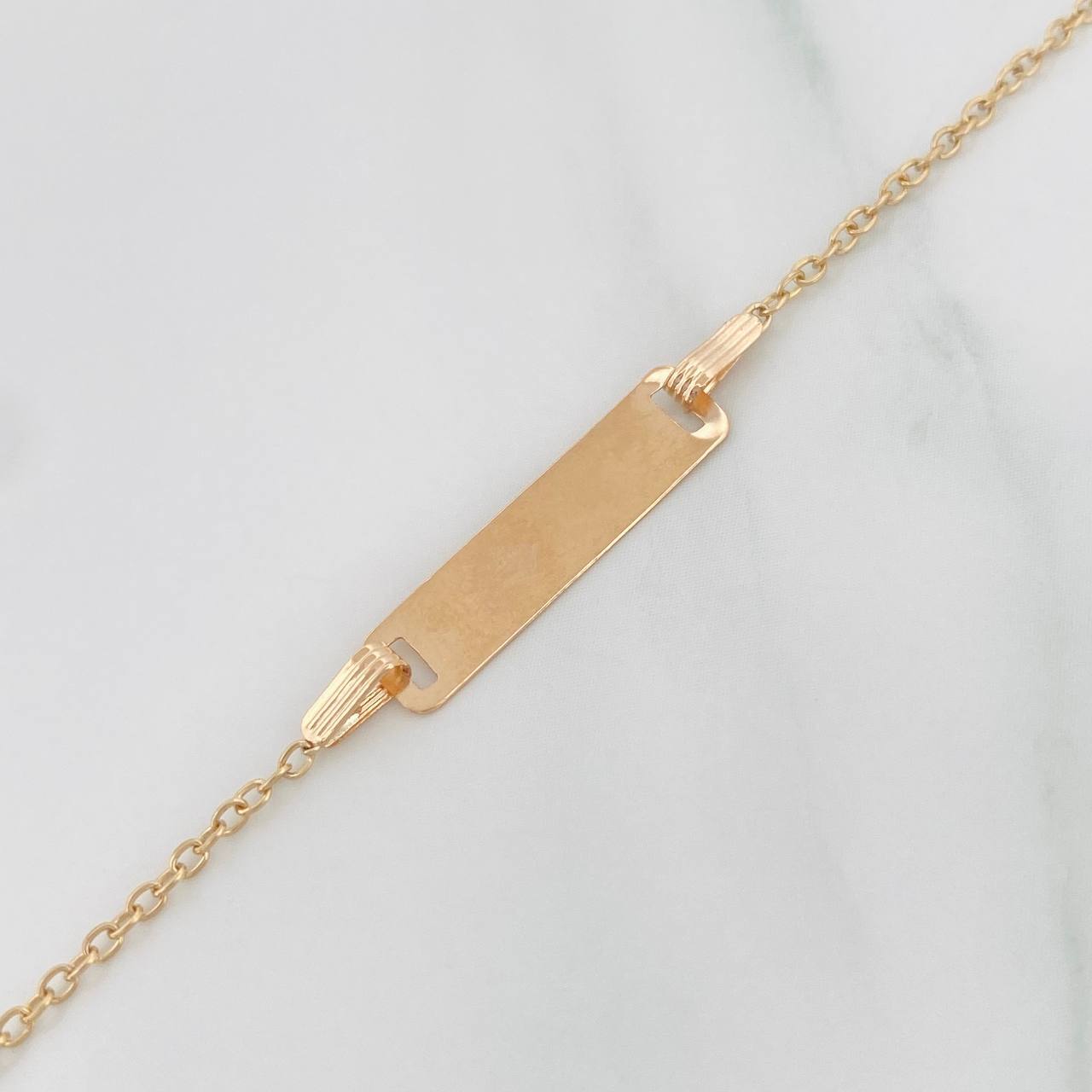 Pulso Bebé Aro Seguido Placa 0.85 g / 15 cm-13.5cm / 1.3 mm Oro Amarillo 18K