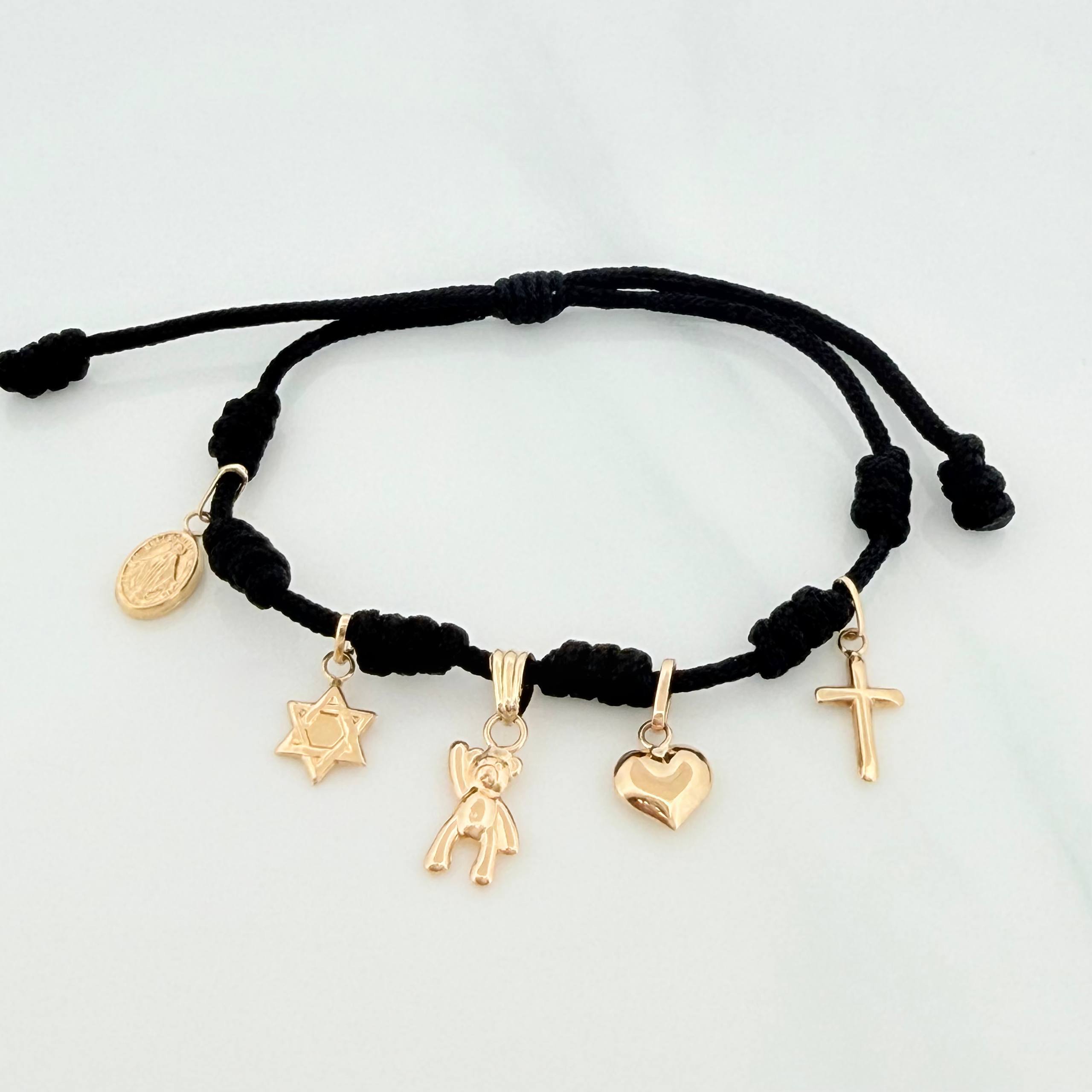 Pulsera Tejida Negra Seis Nudos Oro Amarillo 18K
