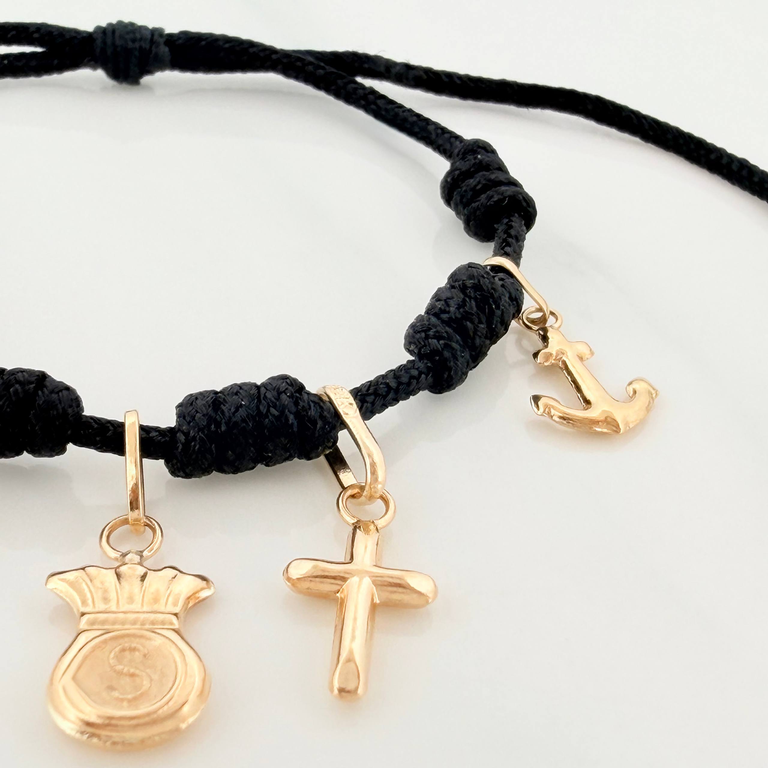 Pulsera Tejida Negra Seis Nudos Oro Amarillo 18K