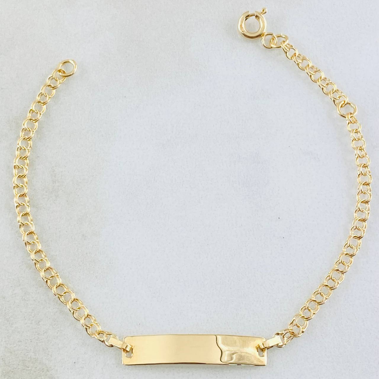 Pulso Bebé Aro Seguido Placa Rectangular 1.35gr / 15cm / Oro Amarillo 18K *