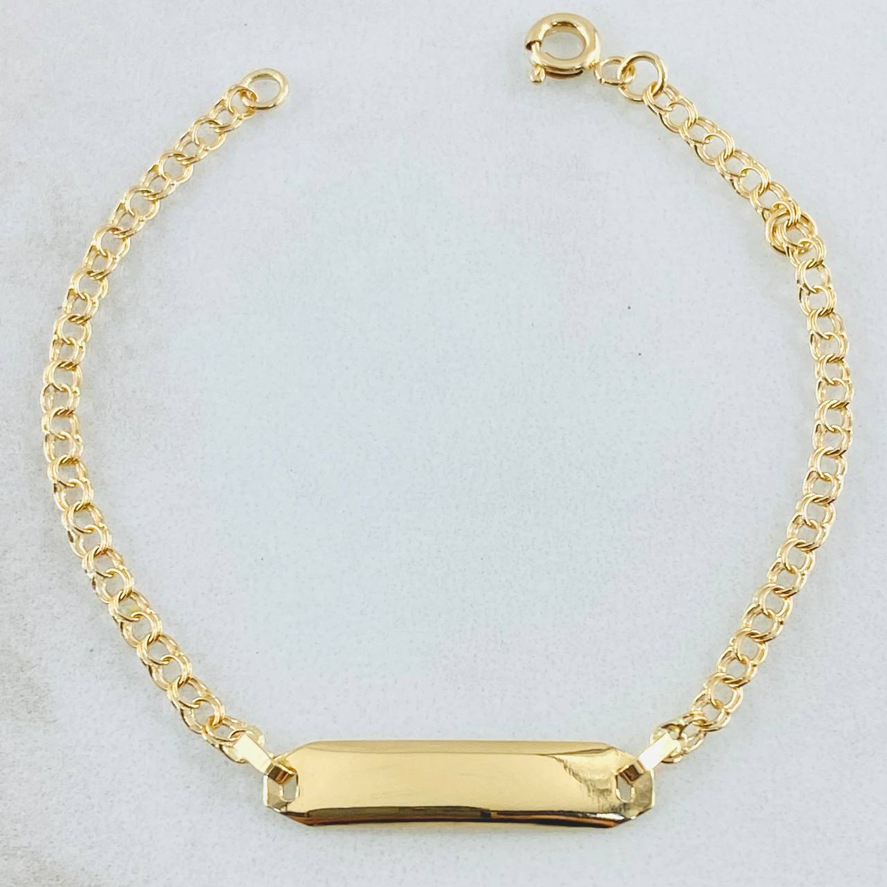 Pulso Bebé Aro Seguido Placa Rectangular Curva 1.3gr / 14cm / Oro Amarillo 18K *