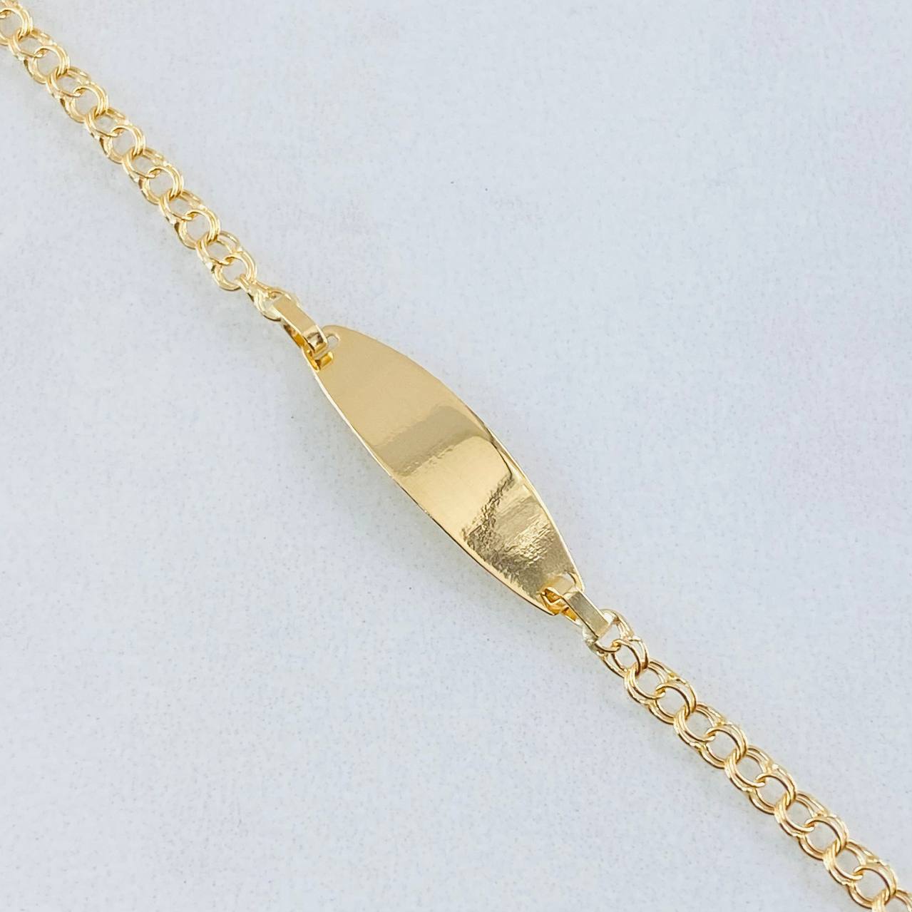Pulso Bebé Aro Seguido Placa Ovalada 1.3gr / 14cm / Oro Amarillo 18K *