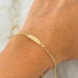 Pulso Bebé Aro Seguido Placa Ovalada 1.3gr / 14cm / Oro Amarillo 18K *