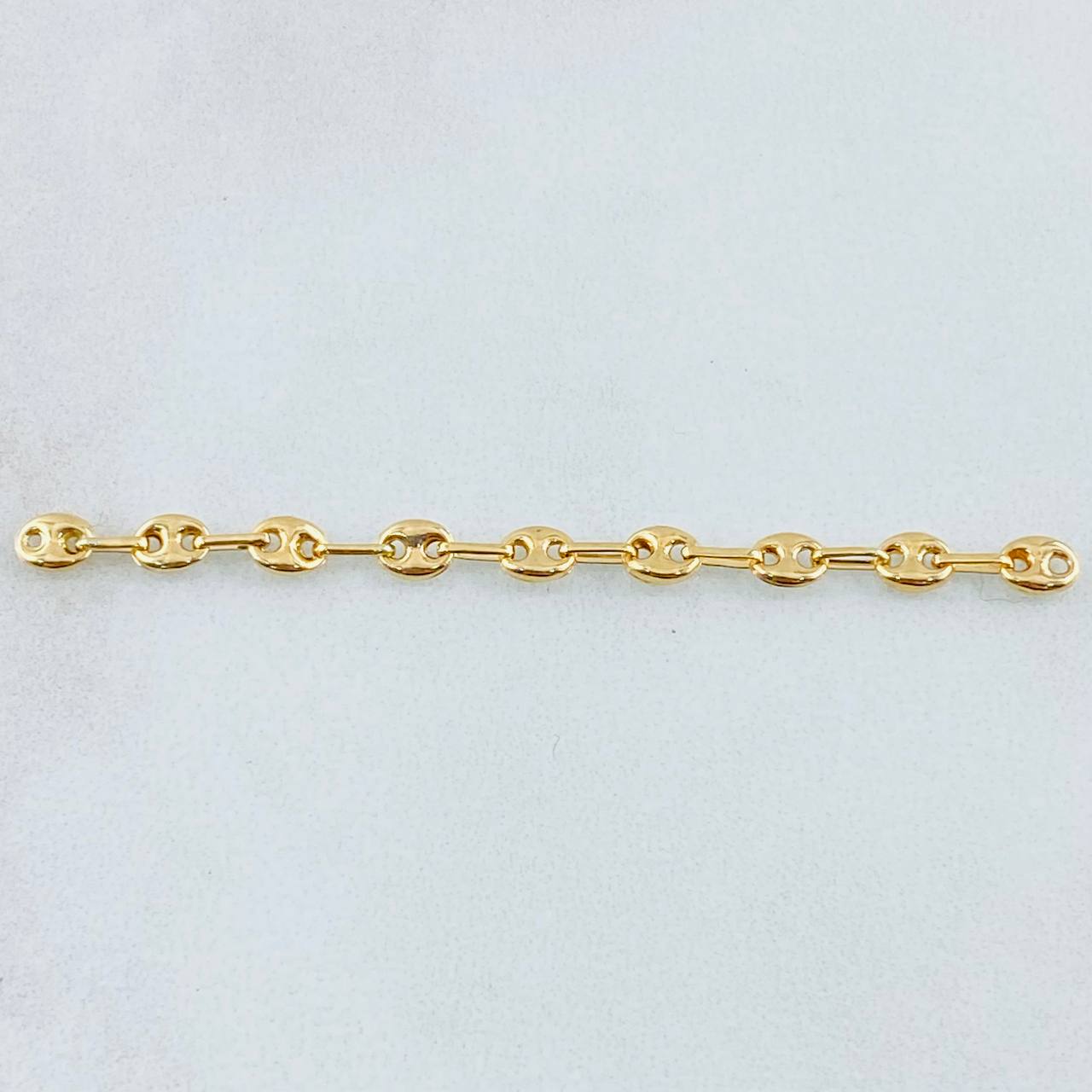 Herraje Retazo GC 0.55gr / 5.5cm / Oro Amarillo 18K ©