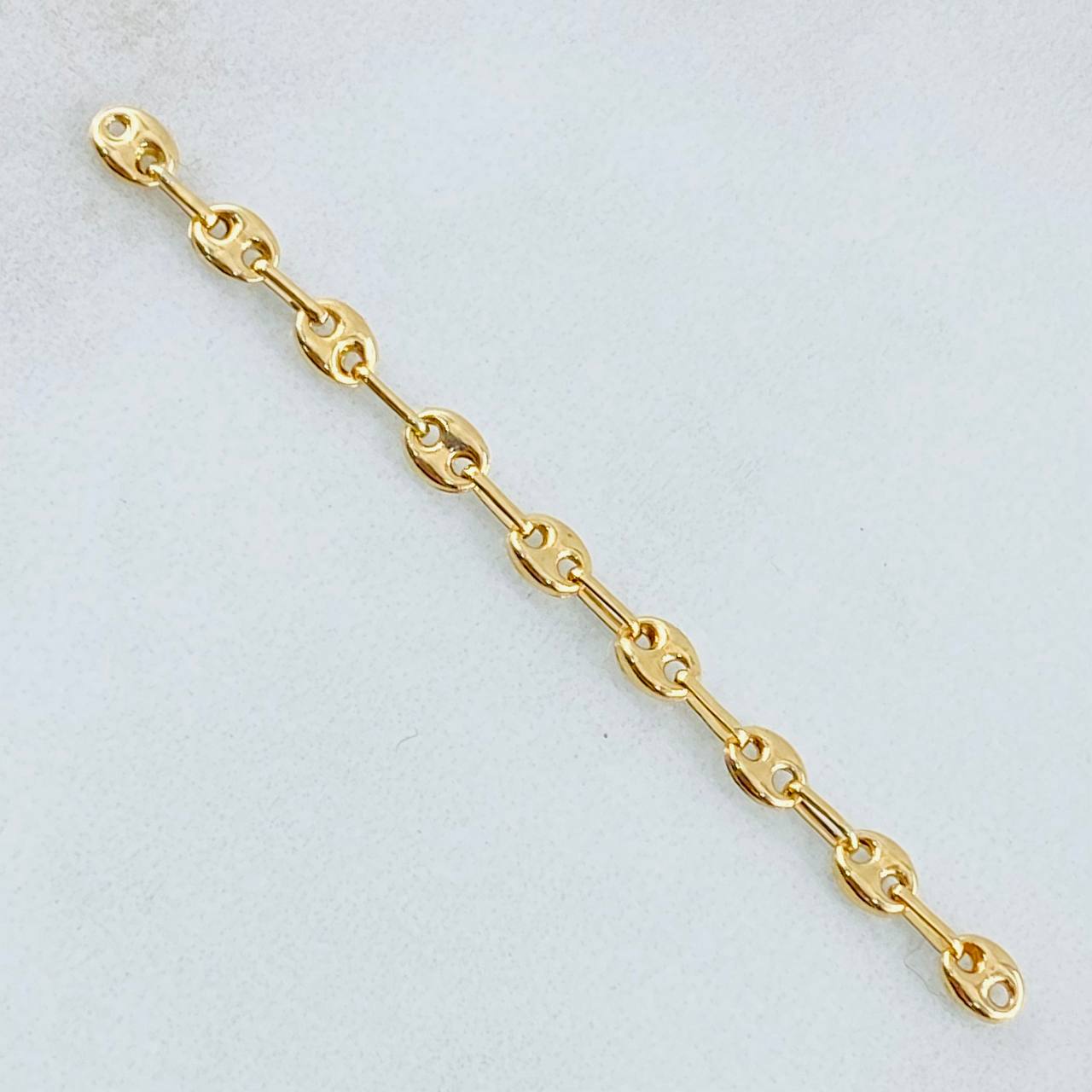 Herraje Retazo GC 0.55gr / 5.5cm / Oro Amarillo 18K ©