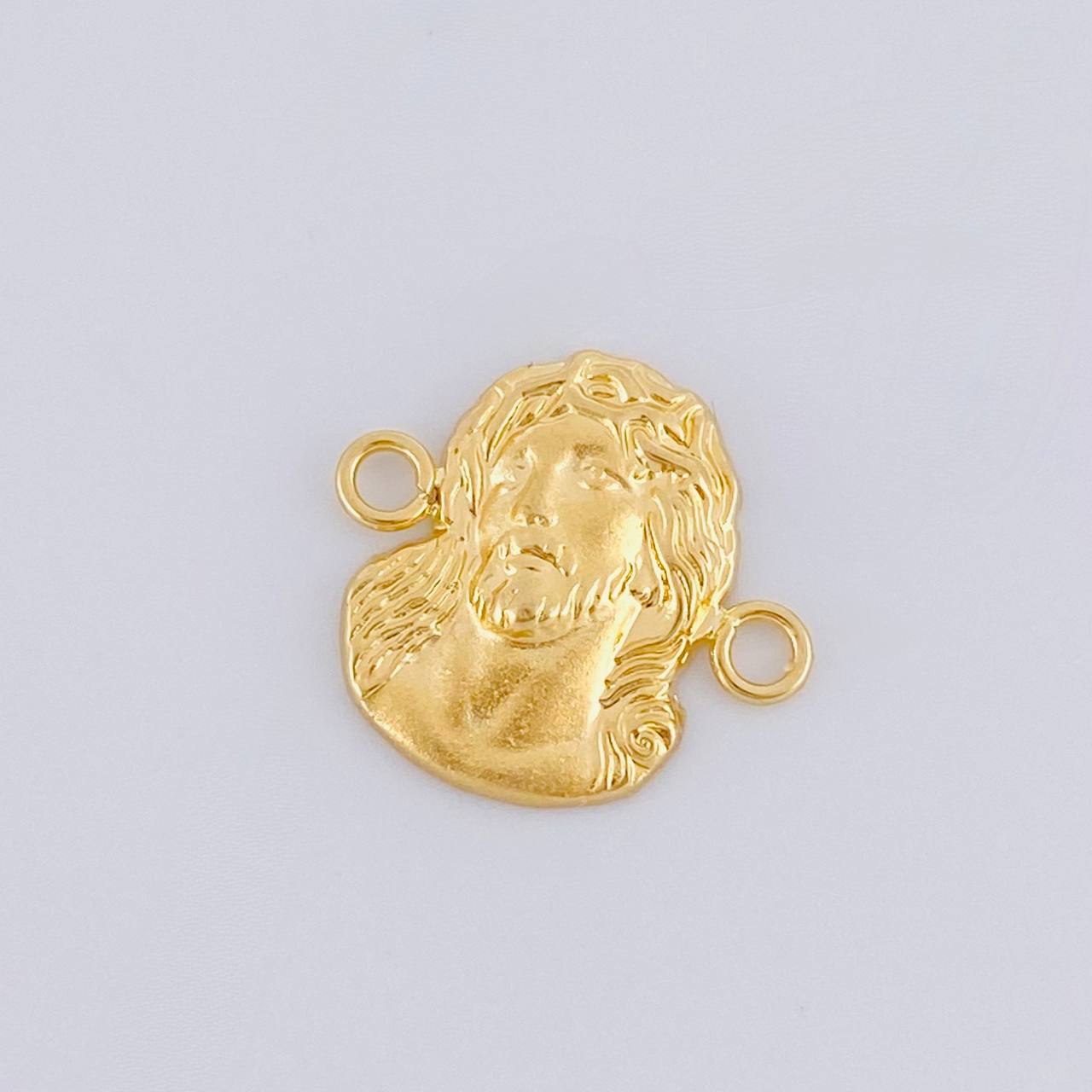 Herraje Rostro de Cristo 0.8g / 1.6cm Oro Amarillo 18K