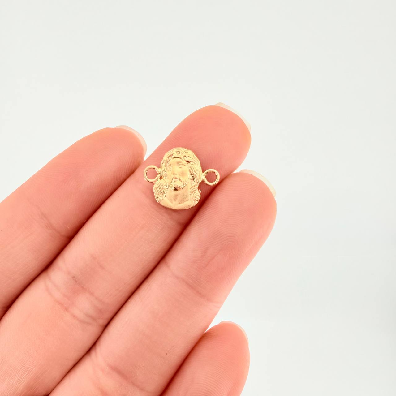 Herraje Rostro de Cristo 0.55g / 1.4cm Oro Amarillo 18K