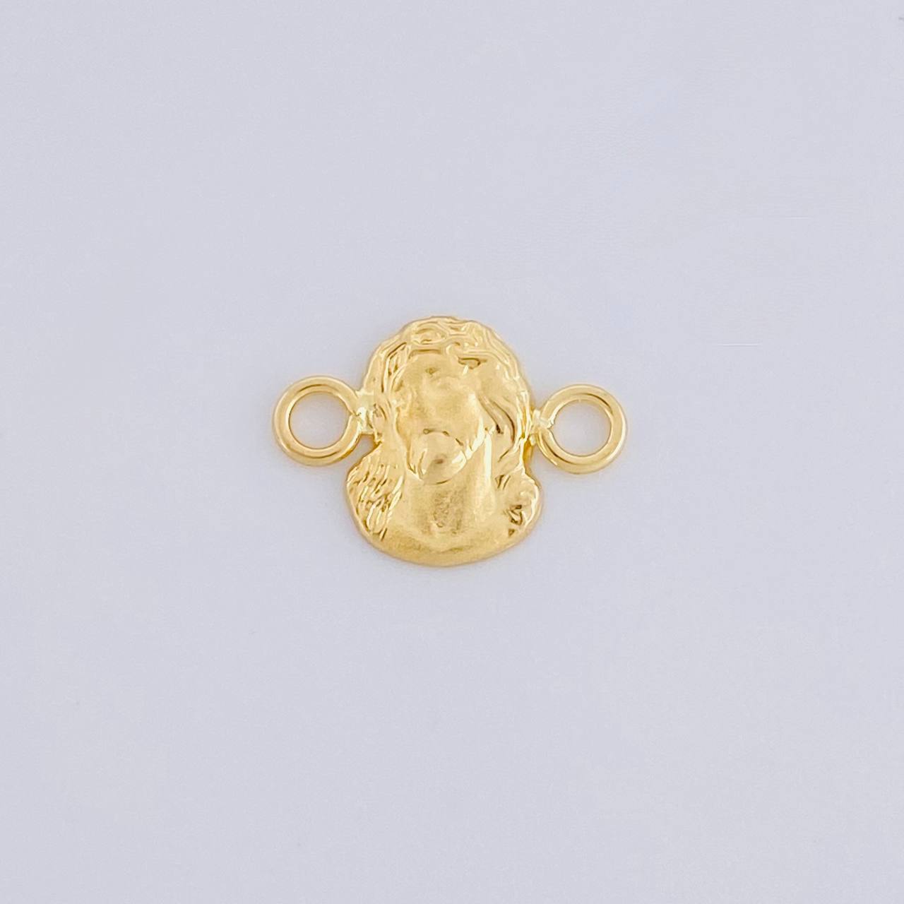 Herraje Rostro de Cristo 0.35g / 1.2cm Oro Amarillo 18K