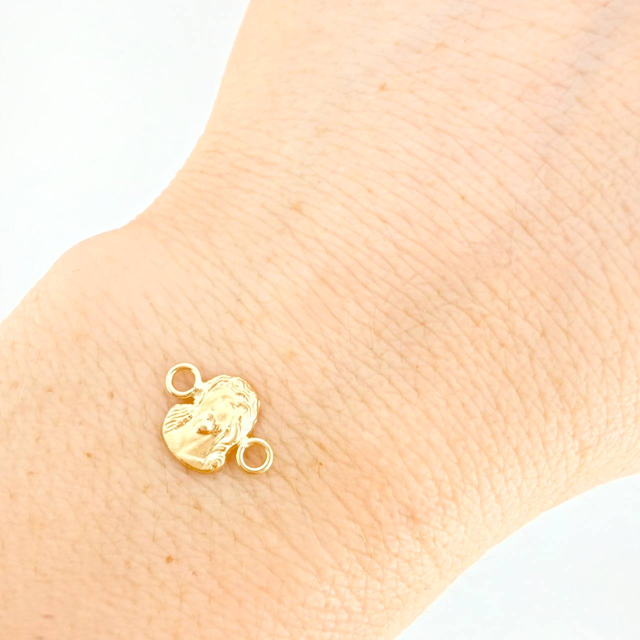 Herraje Rostro de Cristo 0.35g / 1.2cm Oro Amarillo 18K