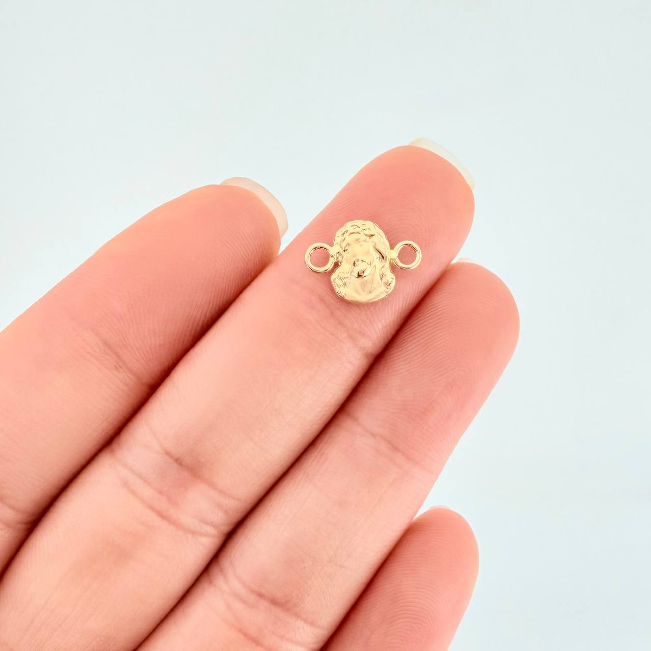 Herraje Rostro de Cristo 0.35g / 1.2cm Oro Amarillo 18K