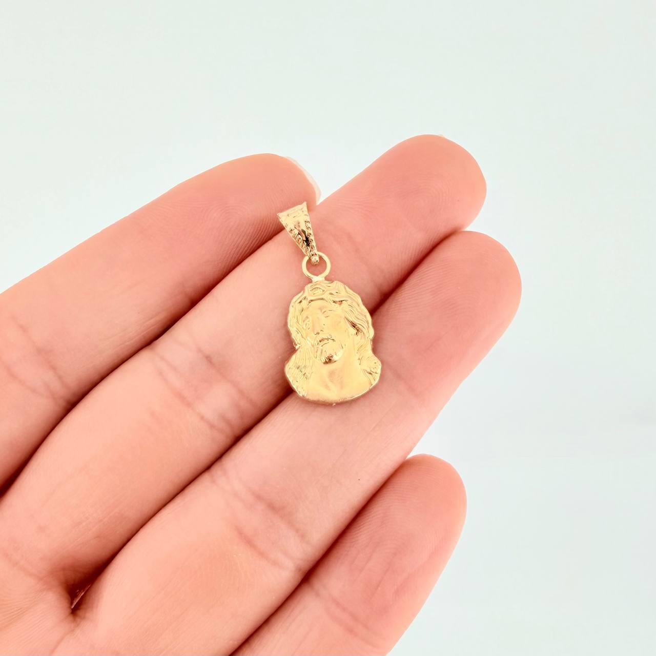 Dije Rostro de Cristo 0.9g / 2.4cm Oro Amarillo 18K