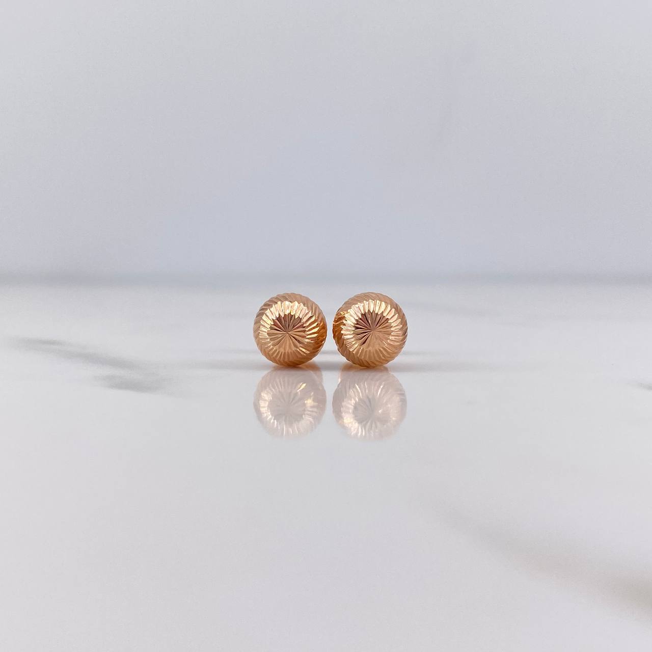 Topos Bola 0.85gr / 7mm Diamantadas Oro Rosa 18K $