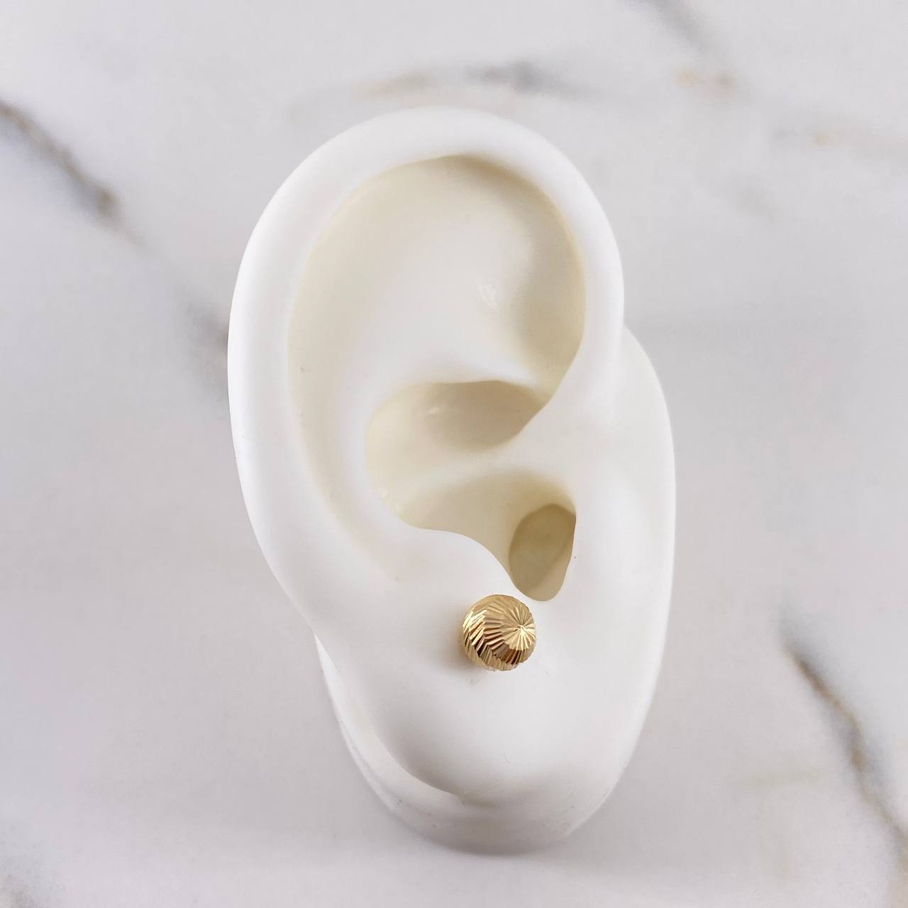 Topos Bola 0.7gr / 6mm Diamantadas Oro Amarillo 18K $
