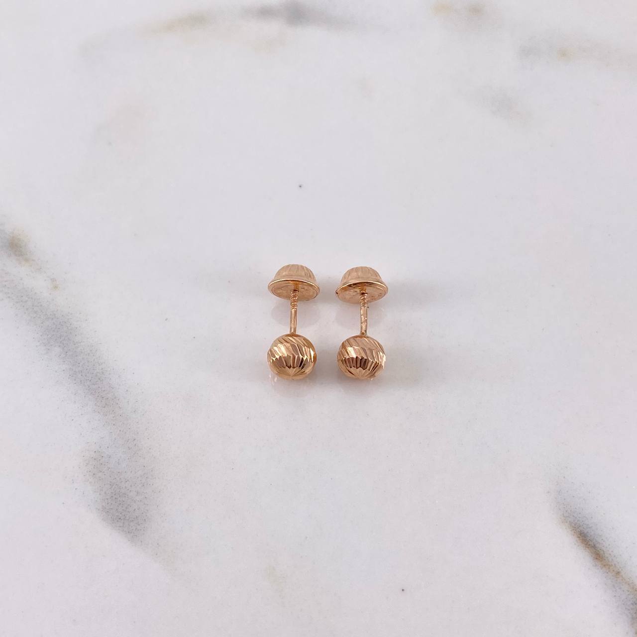 Topos Bola 0.55gr / 5mm Diamantadas Oro Rosa 18K $