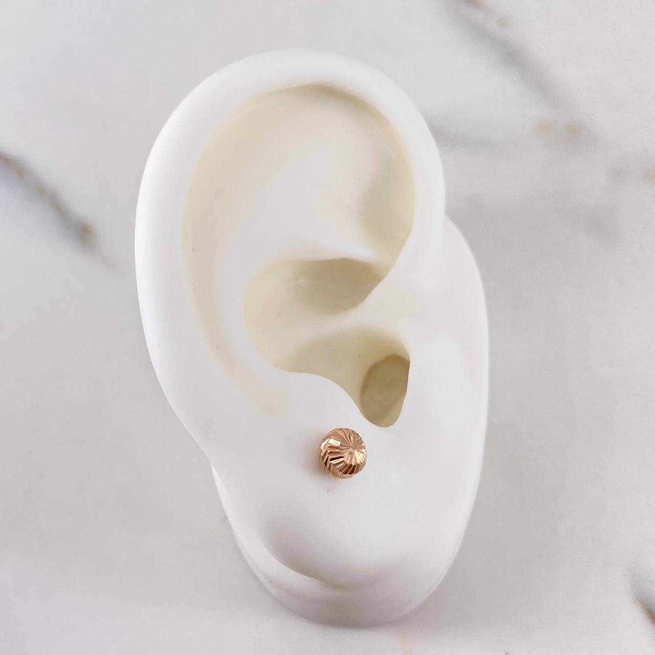 Topos Bola 0.55gr / 5mm Diamantadas Oro Rosa 18K $