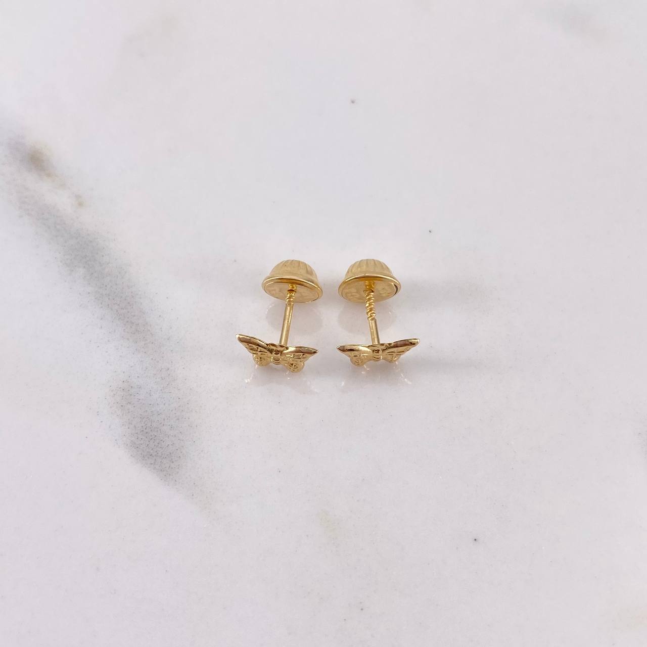 Topos Mariposa 0.45gr / Lisos Oro Amarillo 18K $