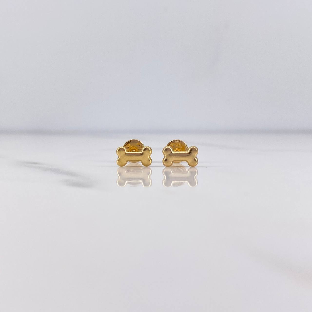 Topos Hueso 0.5gr / Lisos Oro Amarillo 18K $