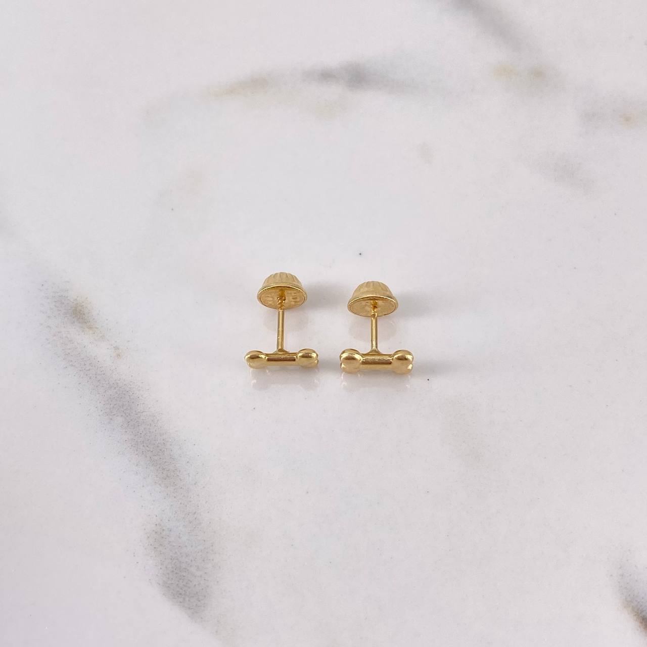 Topos Hueso 0.5gr / Lisos Oro Amarillo 18K $