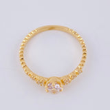 Anillo Solitario Chispa Escalada 1.9 g / T6 Oro Amarillo 18K