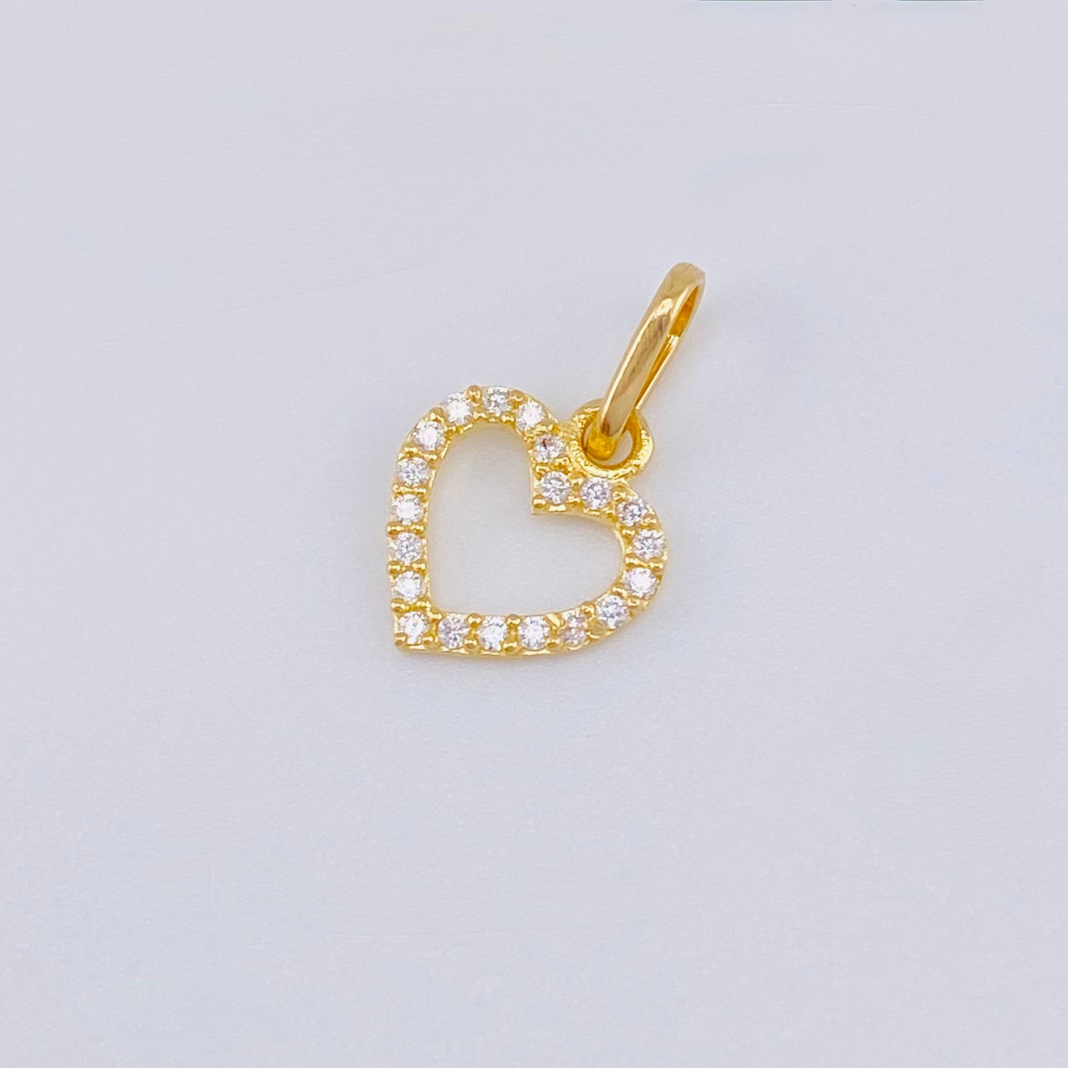 Dije Silueta Corazón Tupida 0.45gr / 1.5cm / Oro Amarillo 18K ©