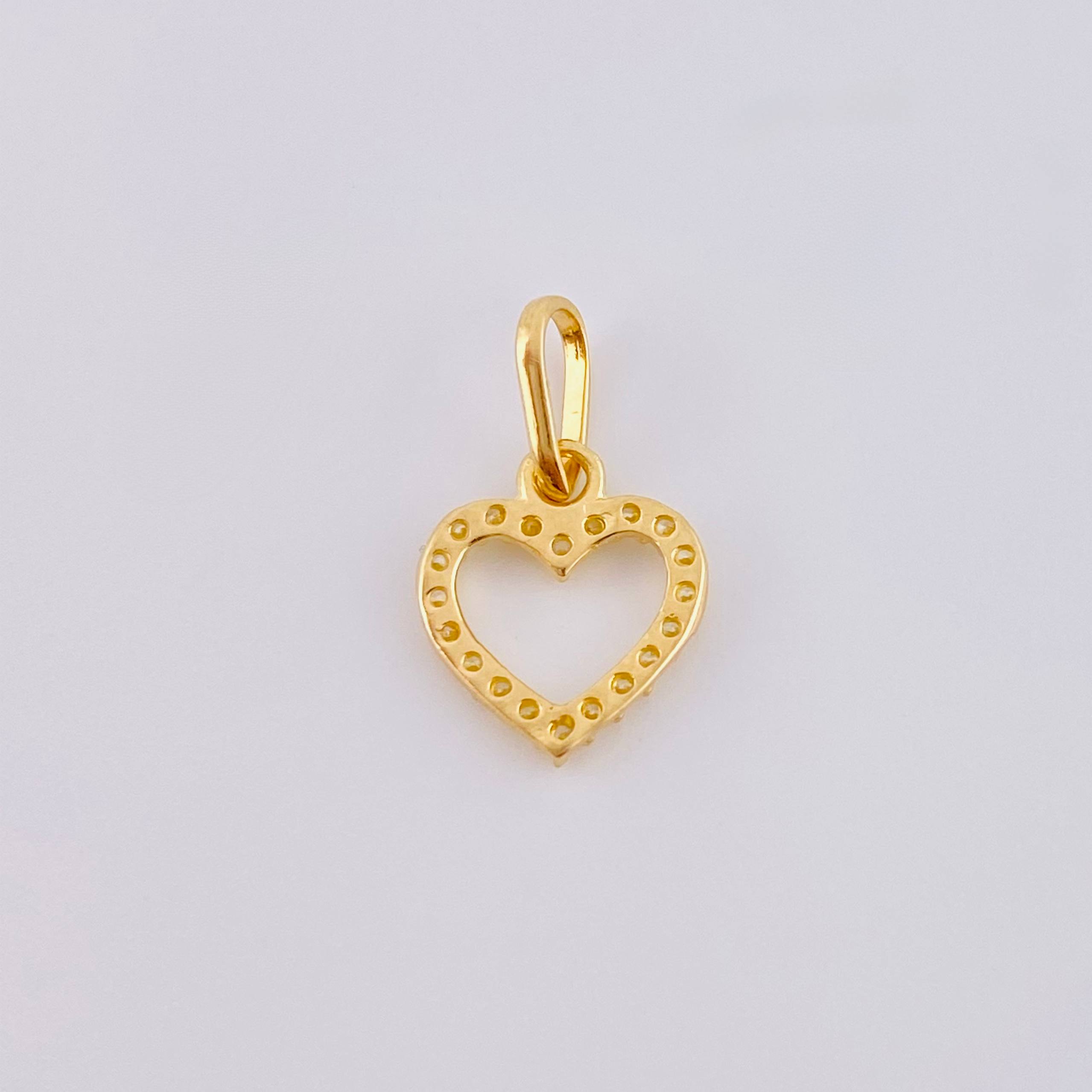 Dije Silueta Corazón Tupida 0.45gr / 1.5cm / Oro Amarillo 18K ©