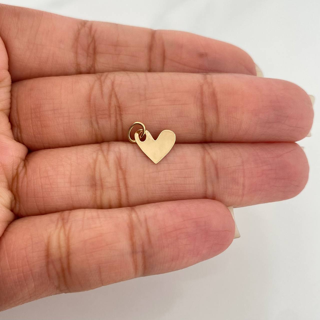 Dije Placa Corazón 0.4gr / 1.2cm / Oro Amarillo 18K %