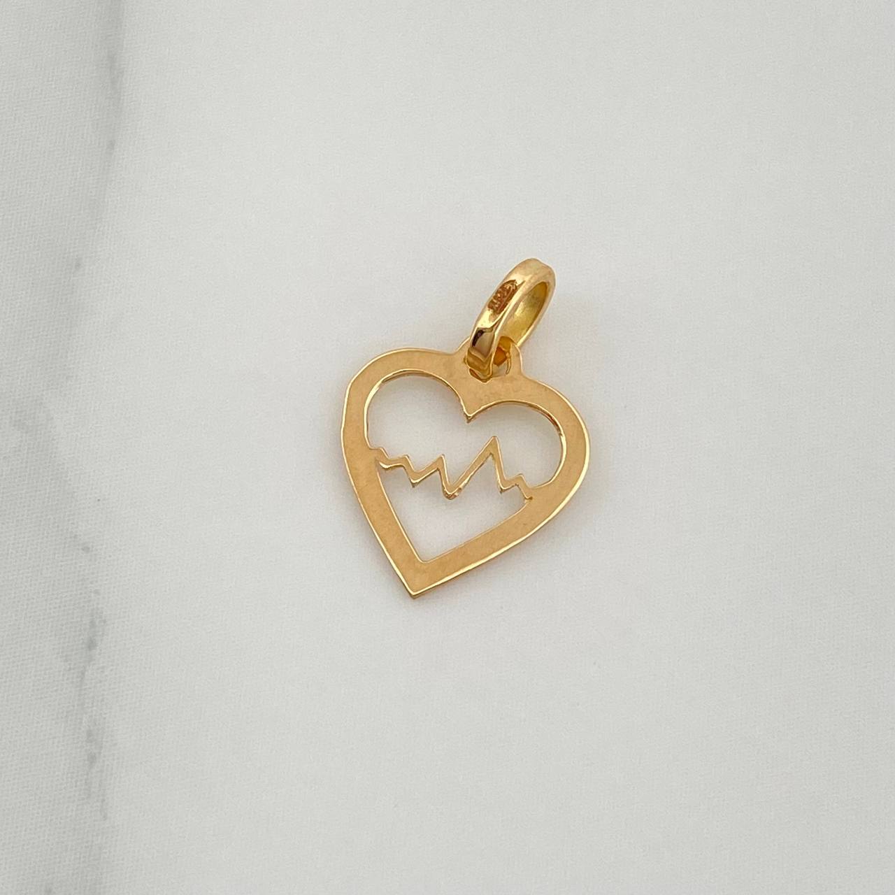 Dije Silueta Corazón 0.25gr / 1.4cm / Oro Amarillo 18K %
