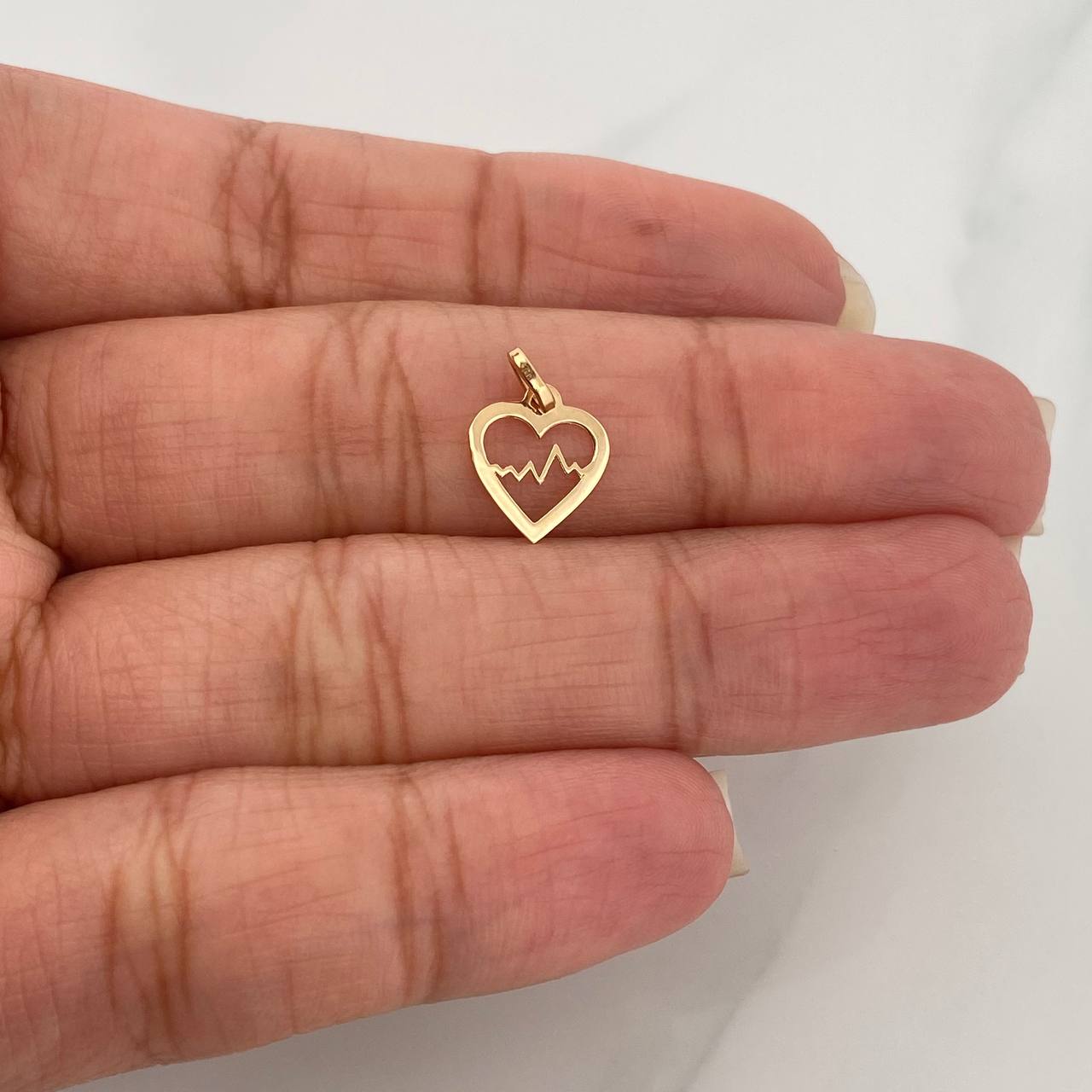 Dije Silueta Corazón 0.25gr / 1.4cm / Oro Amarillo 18K %