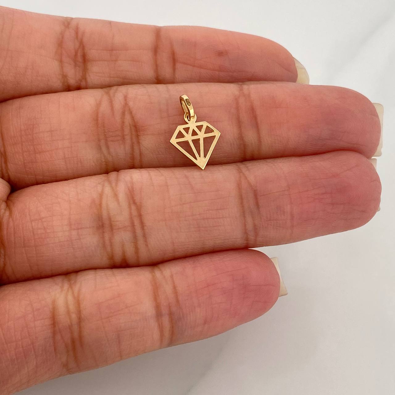 Dije Diamante 0.25gr / 1.4cm / Oro Amarillo 18K %