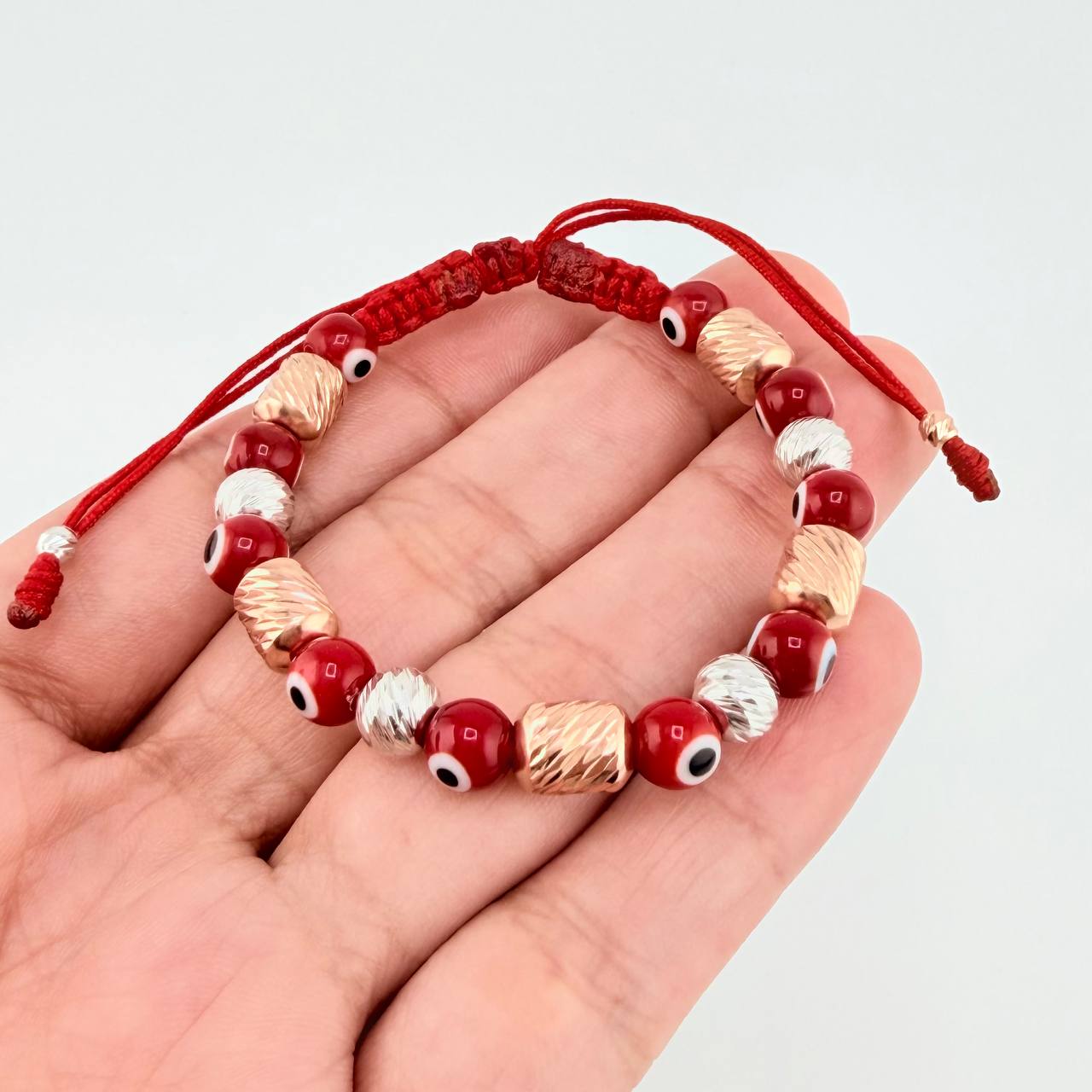 Pulsera Tejida Ojos Turcos Cilindros 6Mm Dos Oros Blanco Rosa 18K