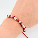 Pulsera Tejida Ojos Turcos Cilindros 6Mm Dos Oros Blanco Rosa 18K