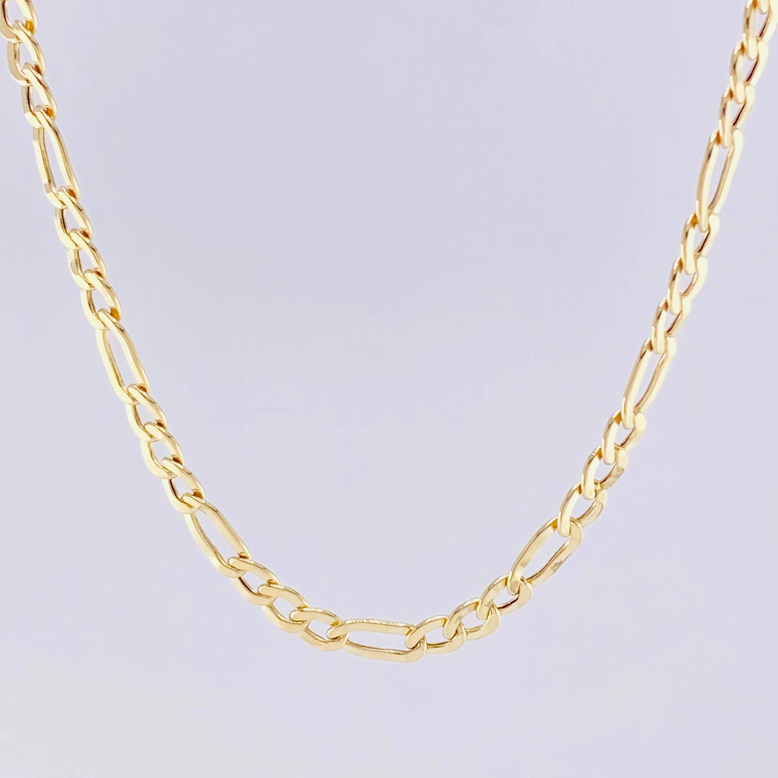 Cadena Figaro 7.4g / 60cm / 4mm Oro Amarillo 18K