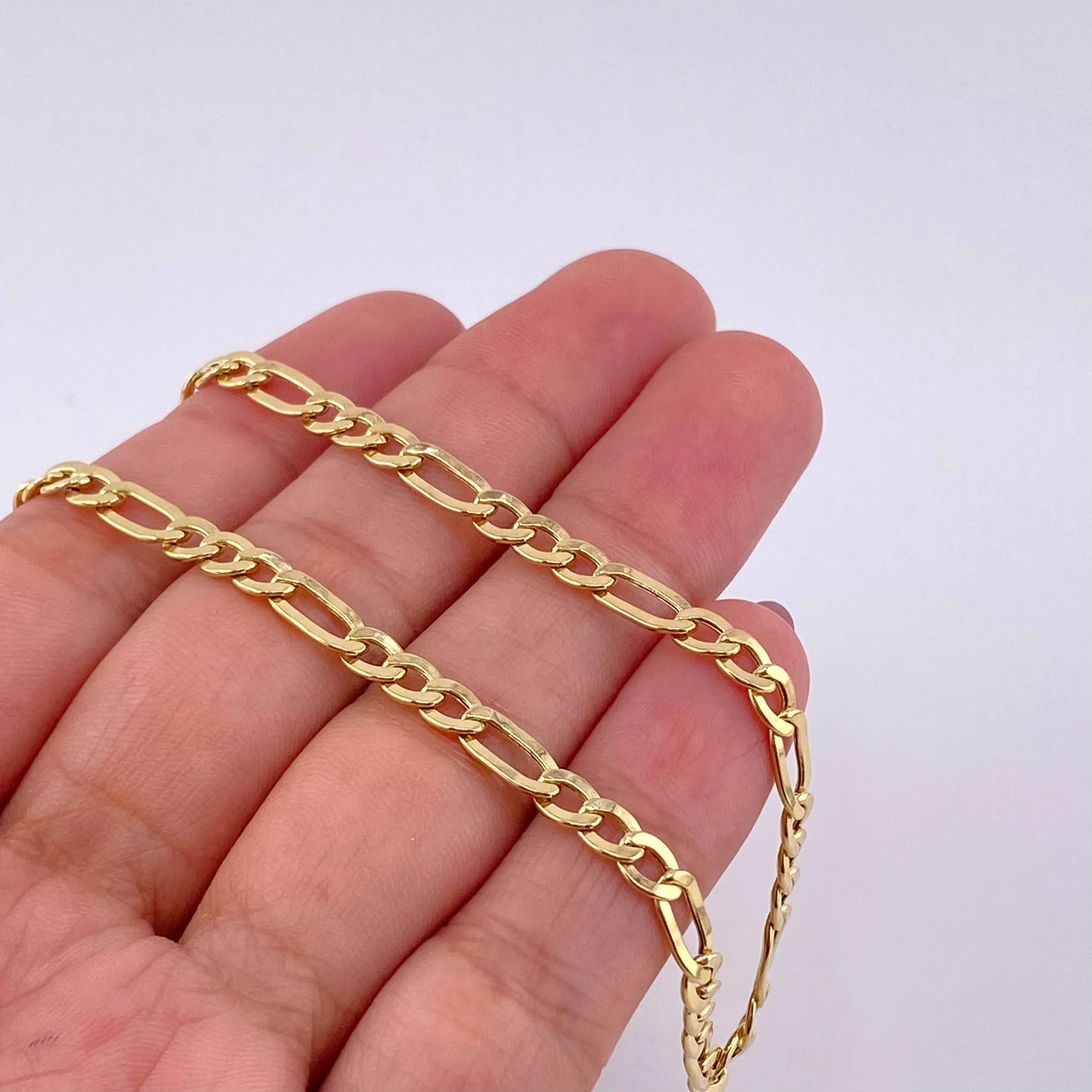Cadena Figaro 7.3g / 60cm / 2.1mm Oro Amarillo 18K