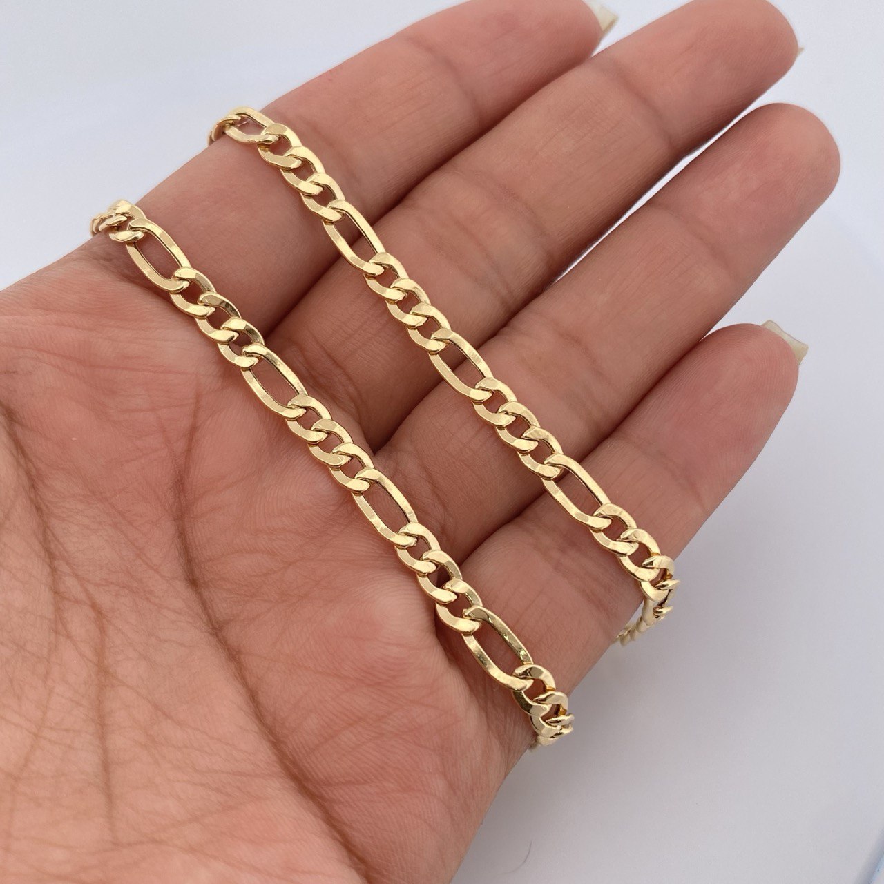 Cadena Figaro 11.2gr / 65cm / +0 Oro 18K &