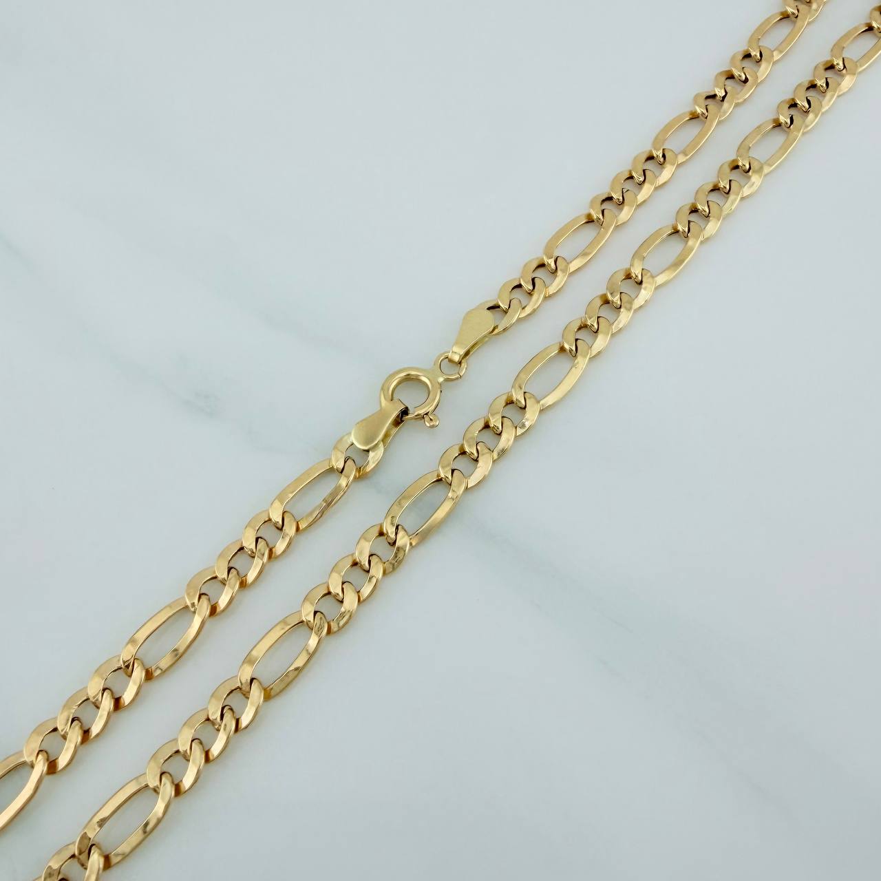 Cadena Figaro 7.55gr / 72.7cm / 4.6mm Oro Amarillo +1 18K $