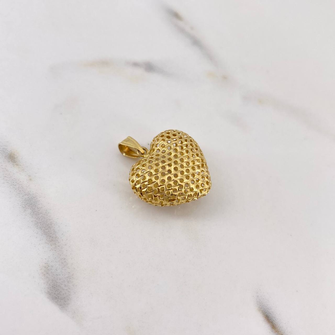 Dije Corazon Filigrana 1.8gr / 2.3cm / Oro Amarillo 18K $