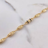Pulso Rustico Corona RX 4.75gr / 21.7cm / 4.5mm Cauchos Negros Oro Amarillo 18K $