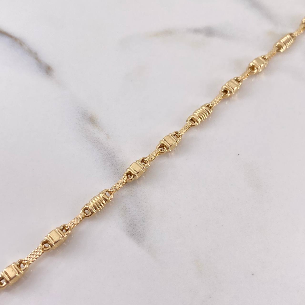 Tobillera Rustica 4.6gr / 24.6cm / 3.5mm Barril Plano Oro Amarillo 18K $
