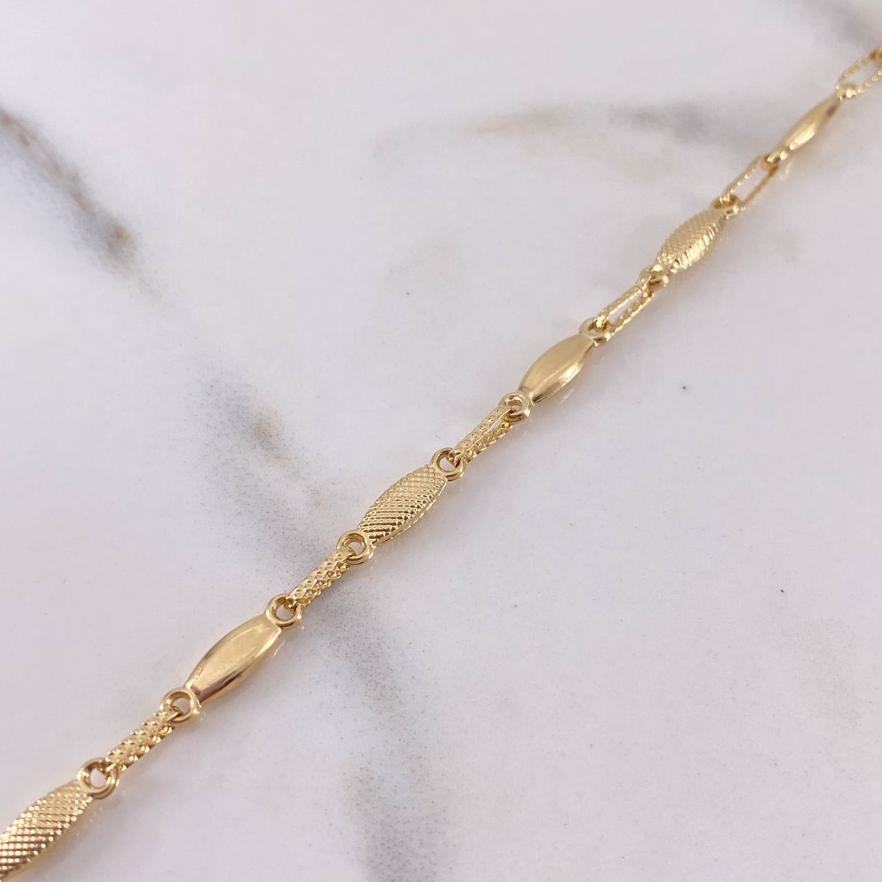 Tobillera Capullo 4gr / 24.4cm / 2.9mm Punteada Oro Amarillo 18K $