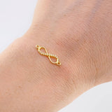 Herraje Infinito 0.45gr / 2cm / Oro Amarillo 18K *