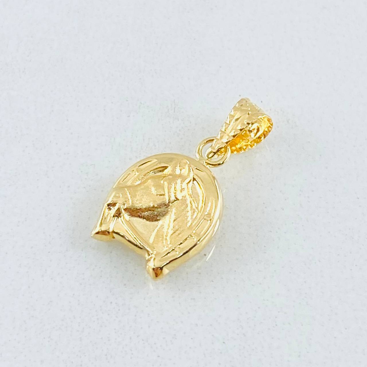 Dije Herradura Caballo 0.55gr / 1.7cm / Oro Amarillo 18K ©